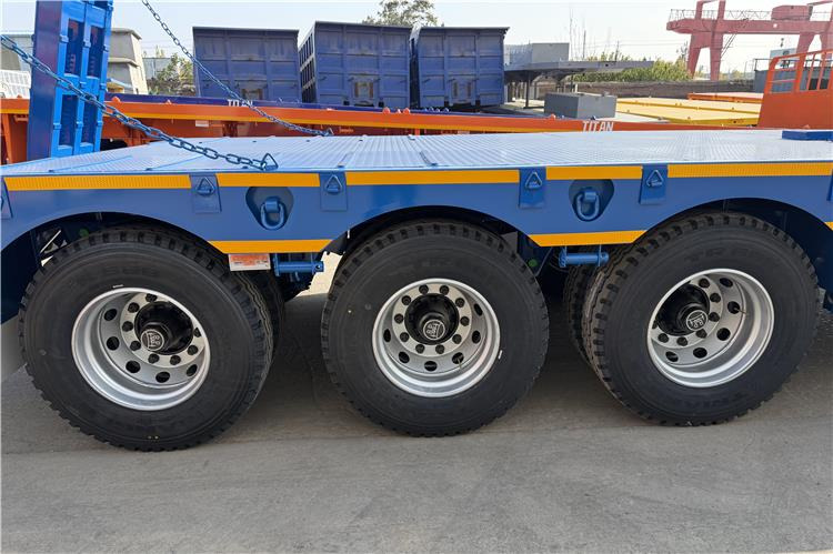 TITAN 3 Axle 80 Ton Low Bed Trailer Price for Sale In Nigeria - Madal platvormpoolhaagis: pilt 2 TITAN 3 Axle 80 Ton Low Bed Trailer Price for Sale In Nigeria - Madal platvormpoolhaagis: pilt 2