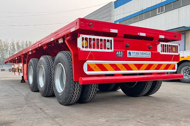 TITAN 3 Axle Flatbed Trailer for Sale in Senegal - Platvorm/ Madelpoolhaagis: pilt 1 TITAN 3 Axle Flatbed Trailer for Sale in Senegal - Platvorm/ Madelpoolhaagis: pilt 1