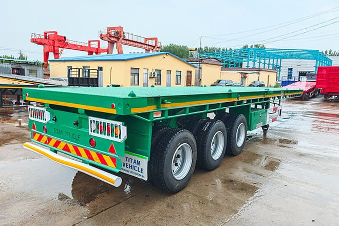 TITAN 40 Foot Tri Axle Flat Deck Trailer for Sale in Senegal - Platvorm/ Madelpoolhaagis: pilt 2 TITAN 40 Foot Tri Axle Flat Deck Trailer for Sale in Senegal - Platvorm/ Madelpoolhaagis: pilt 2