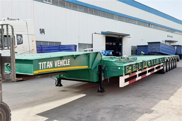 TITAN 6 Axle 80 Ton Low Loader Semi Trailer for Sale In Zambia - Madal platvormpoolhaagis: pilt 1 TITAN 6 Axle 80 Ton Low Loader Semi Trailer for Sale In Zambia - Madal platvormpoolhaagis: pilt 1