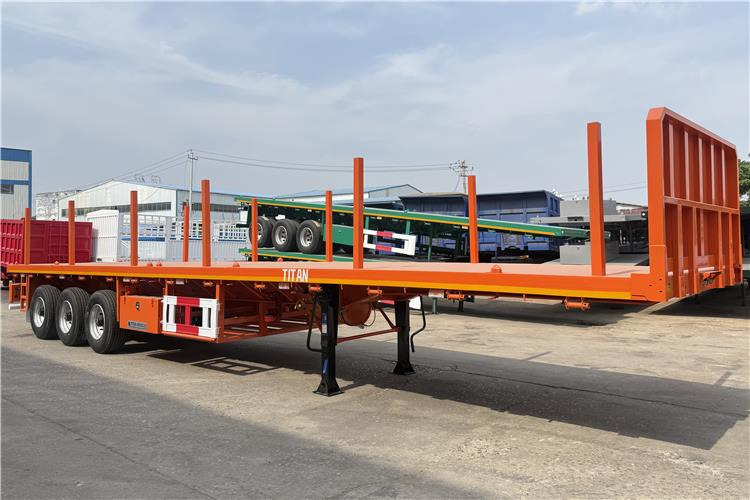 TITAN Container Flatbed Truck Trailer with Piles In Angola - Konteinerveduk/ Tõstukiga poolhaagis: pilt 1 TITAN Container Flatbed Truck Trailer with Piles In Angola - Konteinerveduk/ Tõstukiga poolhaagis: pilt 1