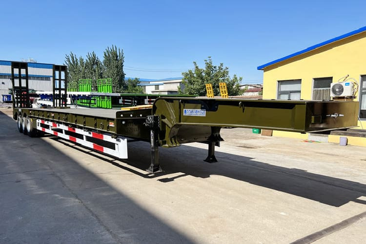 TITAN Low Bed Trailer Truck for Sale in Zambia - Madal platvormpoolhaagis: pilt 1 TITAN Low Bed Trailer Truck for Sale in Zambia - Madal platvormpoolhaagis: pilt 1