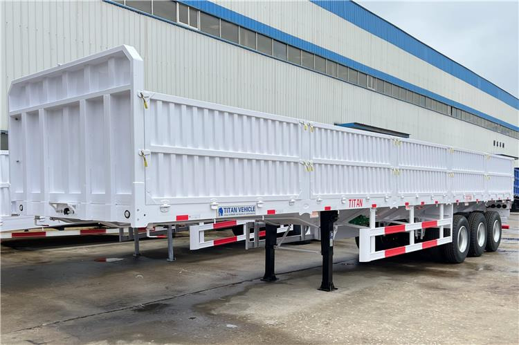 TITAN Tri Axle Dropside Trailer For Sale In Nigeria Lagos - Platvorm/ Madelpoolhaagis: pilt 1 TITAN Tri Axle Dropside Trailer For Sale In Nigeria Lagos - Platvorm/ Madelpoolhaagis: pilt 1