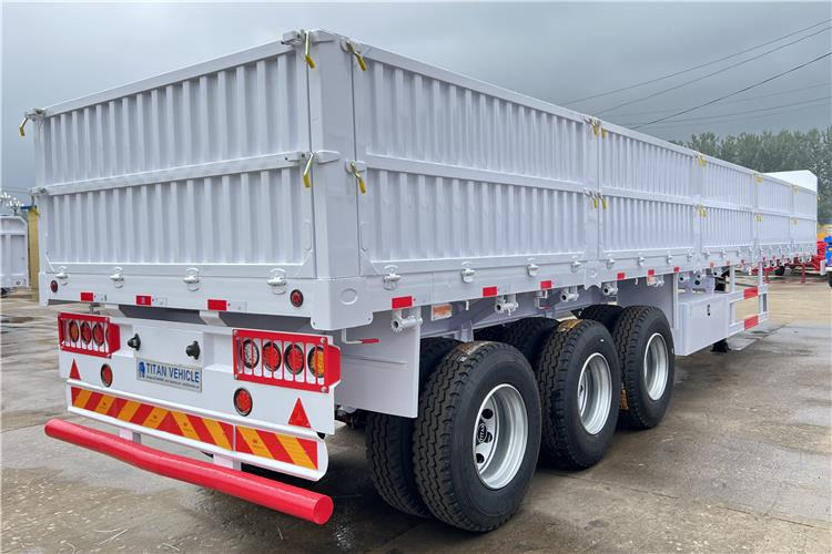 TITAN Tri Axle Dropside Trailer For Sale In Nigeria Lagos - Platvorm/ Madelpoolhaagis: pilt 2 TITAN Tri Axle Dropside Trailer For Sale In Nigeria Lagos - Platvorm/ Madelpoolhaagis: pilt 2