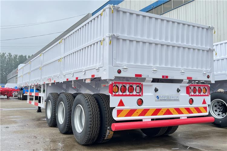 TITAN Tri Axle Dropside Trailer For Sale In Nigeria Lagos - Platvorm/ Madelpoolhaagis: pilt 3 TITAN Tri Axle Dropside Trailer For Sale In Nigeria Lagos - Platvorm/ Madelpoolhaagis: pilt 3