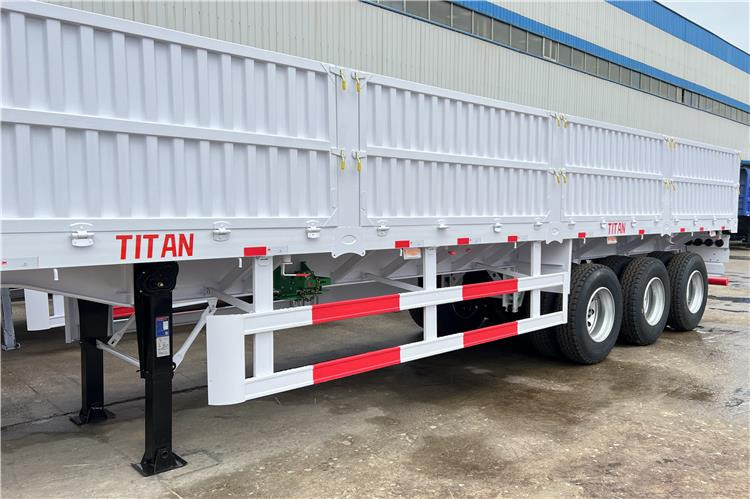 TITAN Tri Axle Dropside Trailer For Sale In Nigeria Lagos - Platvorm/ Madelpoolhaagis: pilt 5 TITAN Tri Axle Dropside Trailer For Sale In Nigeria Lagos - Platvorm/ Madelpoolhaagis: pilt 5