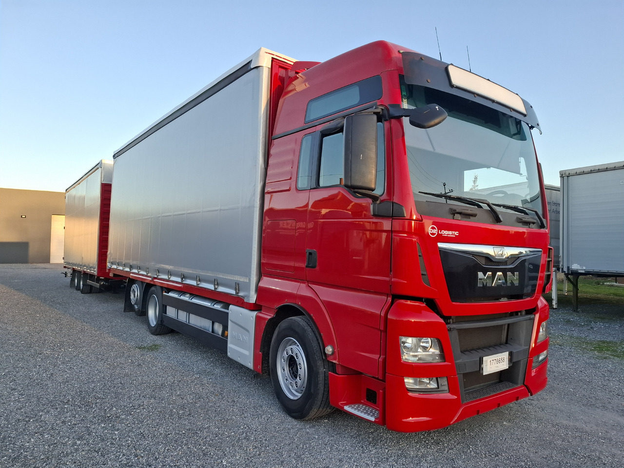 MAN TGX 26.440 E6 + SCHMITZ - Tent veoauto: pilt 4 MAN TGX 26.440 E6 + SCHMITZ - Tent veoauto: pilt 4