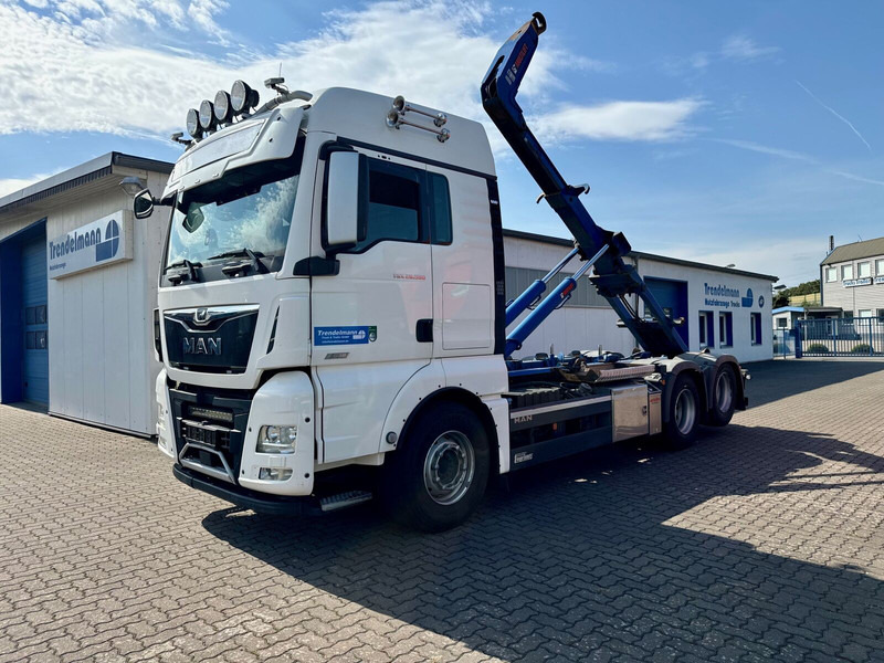 MAN TGX 26.580 BL 6x2 Zwillingbereifte Liftachse Abroller Hiab Funk- - Konkstõstukiga veoauto: pilt 1 MAN TGX 26.580 BL 6x2 Zwillingbereifte Liftachse Abroller Hiab Funk- - Konkstõstukiga veoauto: pilt 1