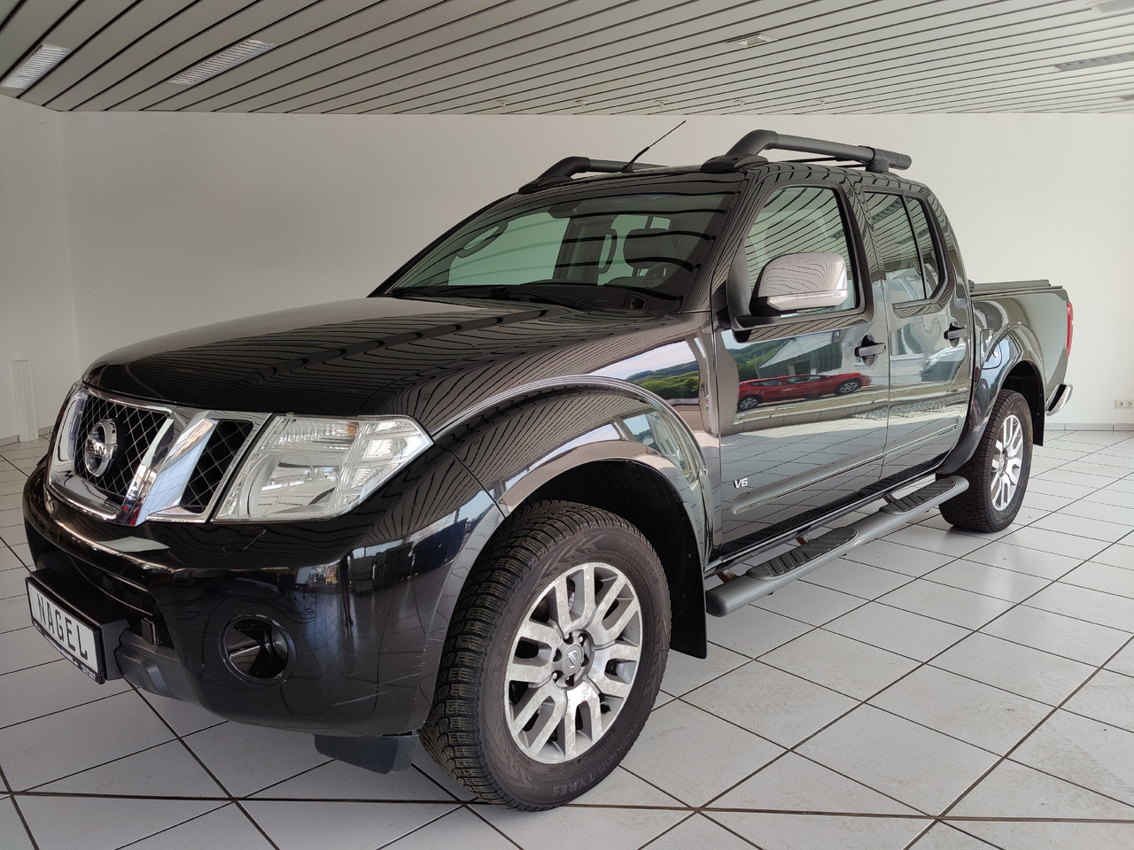 Nissan Navara Pickup (D40M)(05.2005->) Double Cab LE V6 4X4 Navi Kam Leder SHZ AHK - Pikap: pilt 1 Nissan Navara Pickup (D40M)(05.2005->) Double Cab LE V6 4X4 Navi Kam Leder SHZ AHK - Pikap: pilt 1