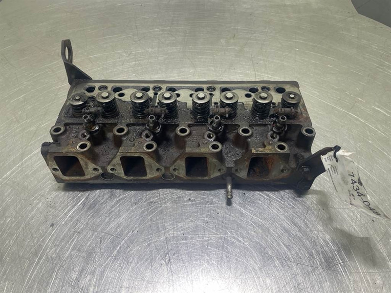 Ahlmann AS900-Cummins B3.3T-Cylinder head/Zylinderköpf - Mootor - Ehitusmasinad: pilt 1 Ahlmann AS900-Cummins B3.3T-Cylinder head/Zylinderköpf - Mootor - Ehitusmasinad: pilt 1