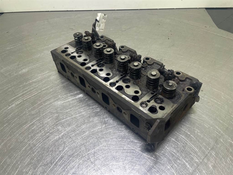 Ahlmann AS900-Cummins B3.3T-Cylinder head/Zylinderköpf - Mootor - Ehitusmasinad: pilt 4 Ahlmann AS900-Cummins B3.3T-Cylinder head/Zylinderköpf - Mootor - Ehitusmasinad: pilt 4