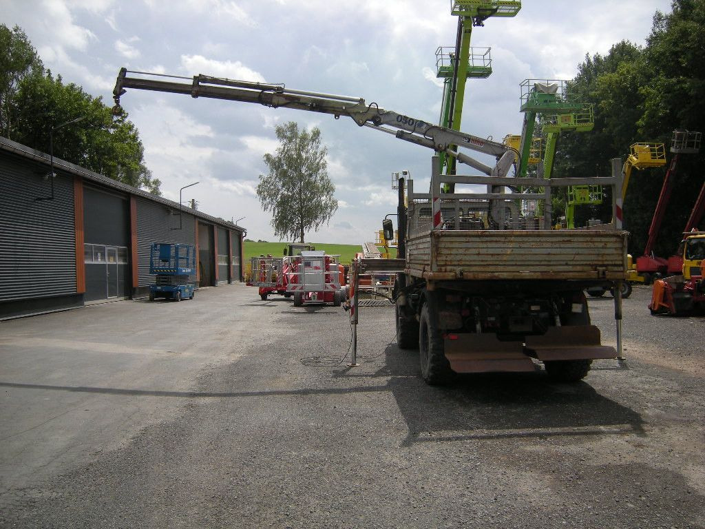 Mercedes-Benz Unimog U1250 mit Kran MKG 105 - Tarbesõiduk kallur: pilt 4 Mercedes-Benz Unimog U1250 mit Kran MKG 105 - Tarbesõiduk kallur: pilt 4
