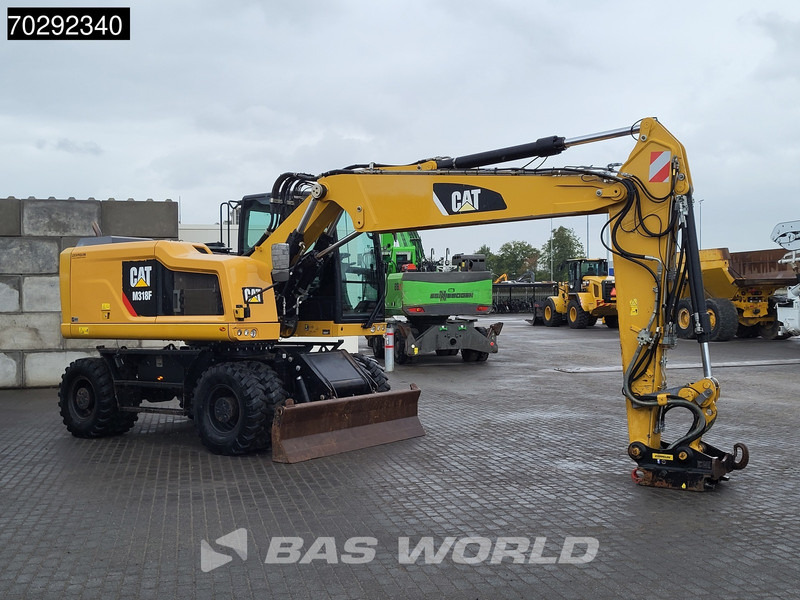 Caterpillar M318 F GERMAN MACHINE - Ratastel ekskavaator: pilt 5 Caterpillar M318 F GERMAN MACHINE - Ratastel ekskavaator: pilt 5