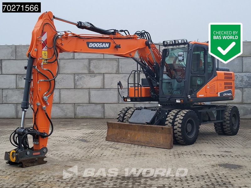 Doosan DX140 W-5 OIL QUICK - GERMAN - Ratastel ekskavaator: pilt 1 Doosan DX140 W-5 OIL QUICK - GERMAN - Ratastel ekskavaator: pilt 1