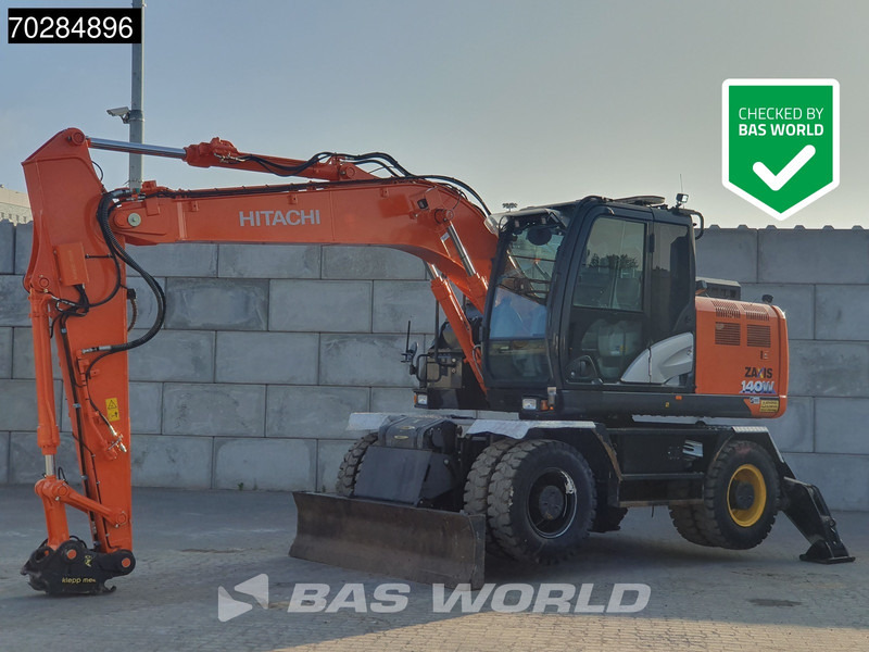 Hitachi ZX140W -6 OUTRIGGERS + BLADE - Ratastel ekskavaator: pilt 1 Hitachi ZX140W -6 OUTRIGGERS + BLADE - Ratastel ekskavaator: pilt 1
