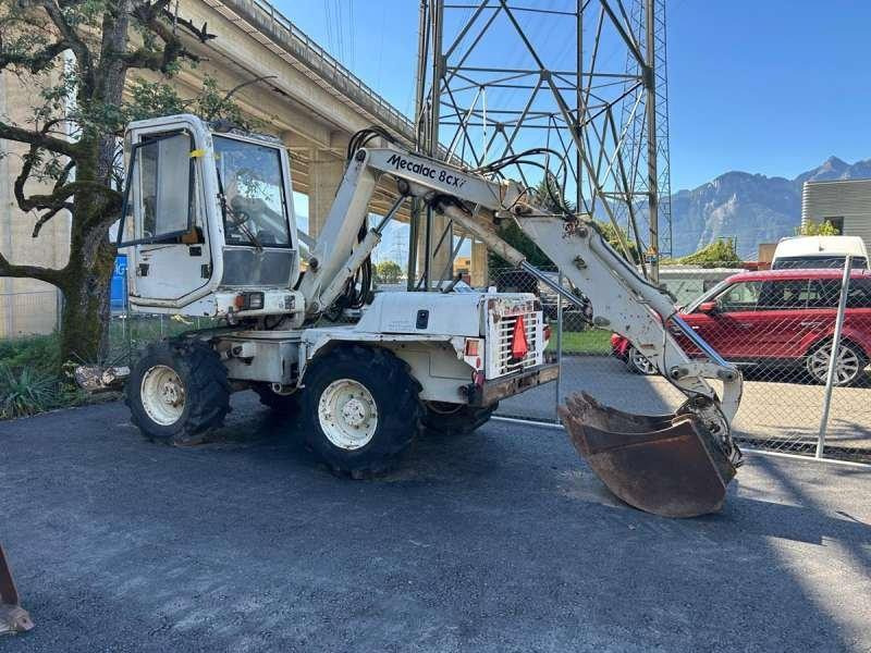 Mecalac 8CXI - Ratastel ekskavaator: pilt 1 Mecalac 8CXI - Ratastel ekskavaator: pilt 1