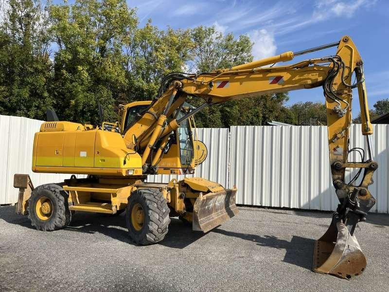 Volvo Pelle sur Pneus EW140D - Ratastel ekskavaator: pilt 1 Volvo Pelle sur Pneus EW140D - Ratastel ekskavaator: pilt 1