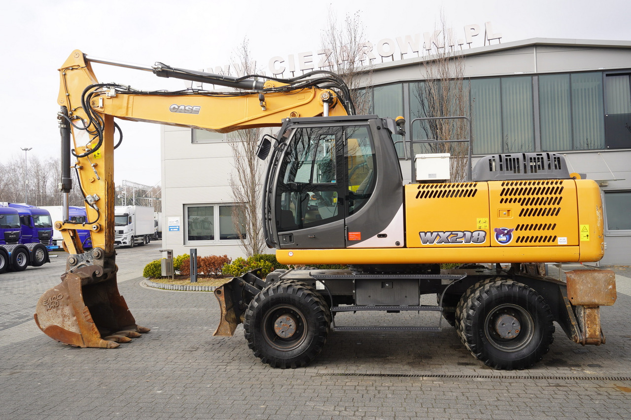 CASE WX218 / 23t wheeled excavator / 3 times folding arm - Ratastel ekskavaator: pilt 1 CASE WX218 / 23t wheeled excavator / 3 times folding arm - Ratastel ekskavaator: pilt 1