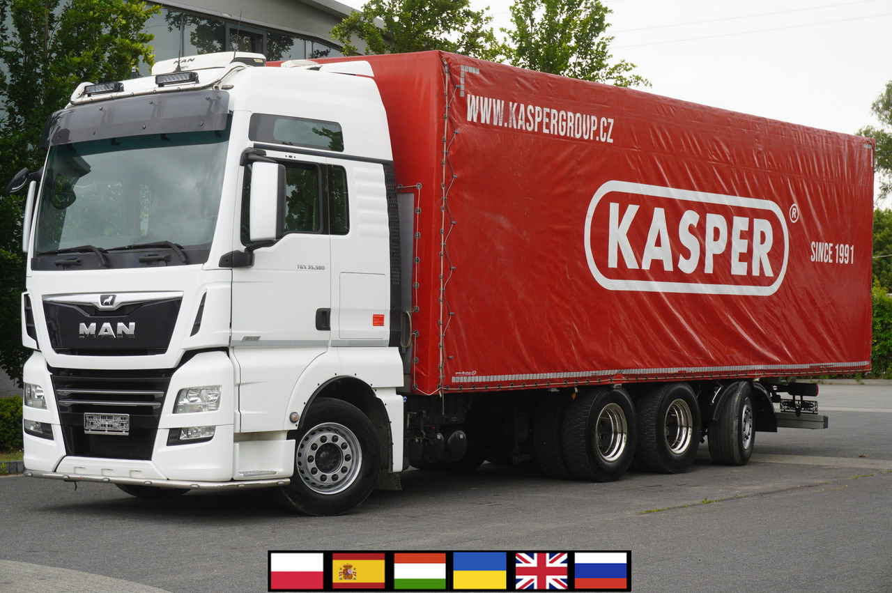 MAN MAN TGX 35.580 E6 8x4 /4 / 23 EPAL tarp superstructure / 4th axle steered - Tent veoauto: pilt 1 MAN MAN TGX 35.580 E6 8x4 /4 / 23 EPAL tarp superstructure / 4th axle steered - Tent veoauto: pilt 1
