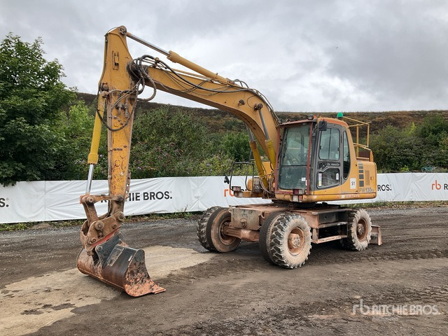 Ratastel ekskavaator 1998 Komatsu PW130ES Wheel Excavator: pilt 1