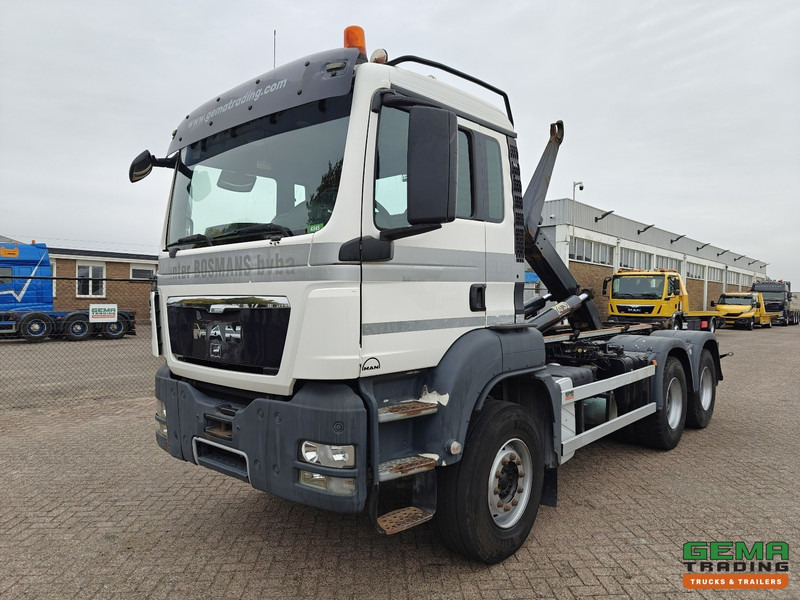 MAN TGS-TGX 26.440 6x4 Dagcabine Euro5 - AJK 20T HaakarmSysteem - Volledig Bladgeveerd - Naafreductie - Handgeschakeld - Konkstõstukiga veoauto: pilt 1 MAN TGS-TGX 26.440 6x4 Dagcabine Euro5 - AJK 20T HaakarmSysteem - Volledig Bladgeveerd - Naafreductie - Handgeschakeld - Konkstõstukiga veoauto: pilt 1