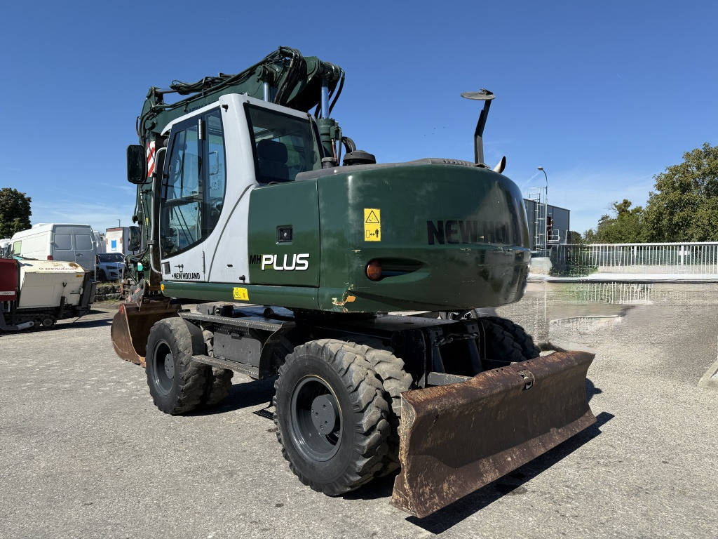 New Holland MH-Plus (111695) - Ratastel ekskavaator: pilt 4 New Holland MH-Plus (111695) - Ratastel ekskavaator: pilt 4