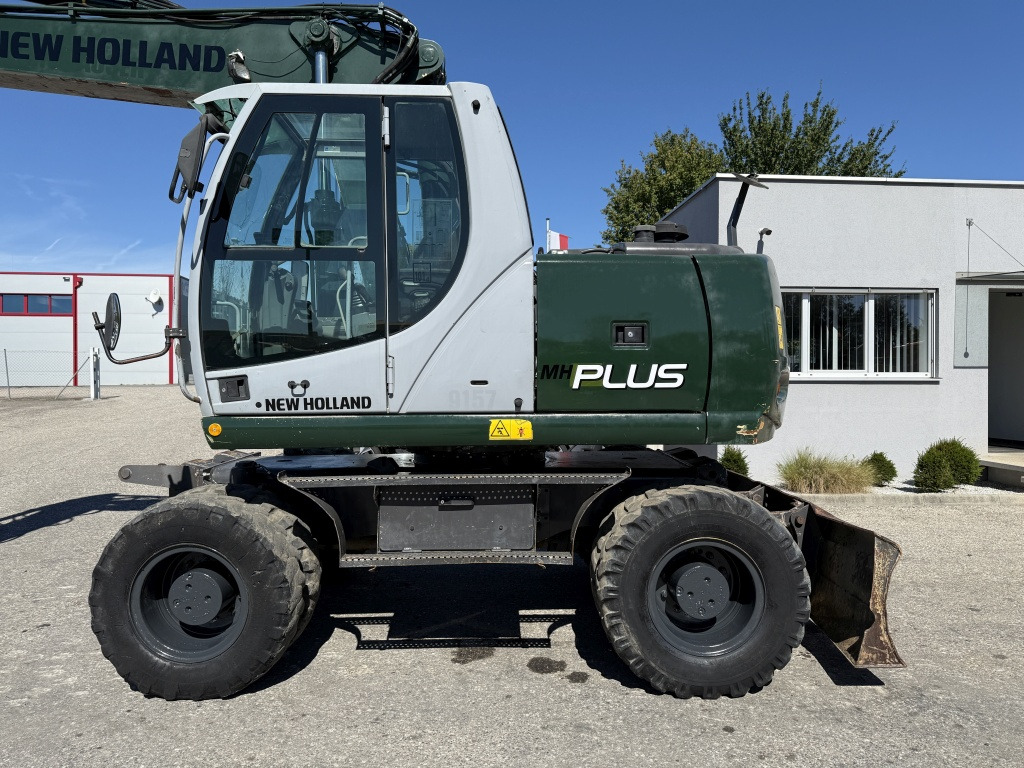 New Holland MH-Plus (111695) - Ratastel ekskavaator: pilt 2 New Holland MH-Plus (111695) - Ratastel ekskavaator: pilt 2
