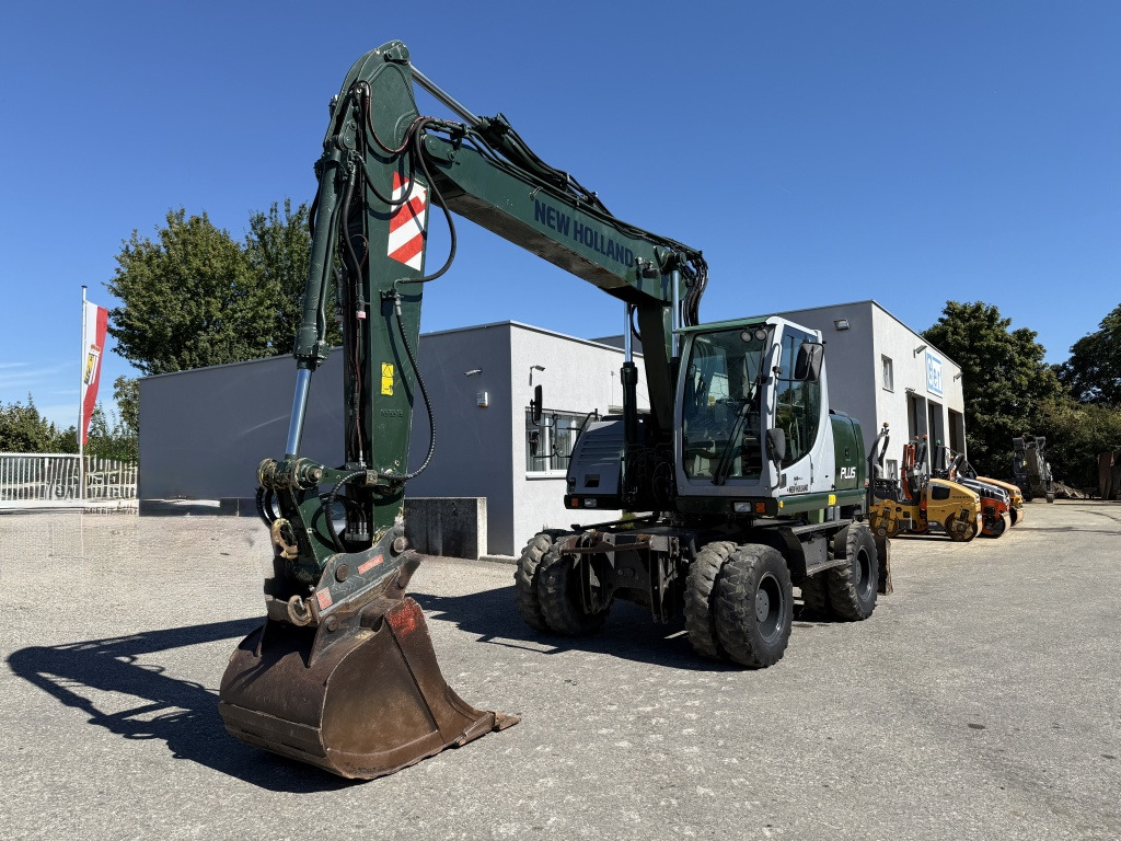 New Holland MH-Plus (111695) - Ratastel ekskavaator: pilt 3 New Holland MH-Plus (111695) - Ratastel ekskavaator: pilt 3