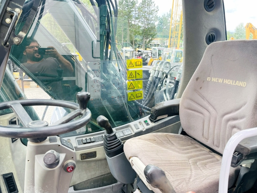 New Holland MH Plus (4054) - Ratastel ekskavaator: pilt 5 New Holland MH Plus (4054) - Ratastel ekskavaator: pilt 5