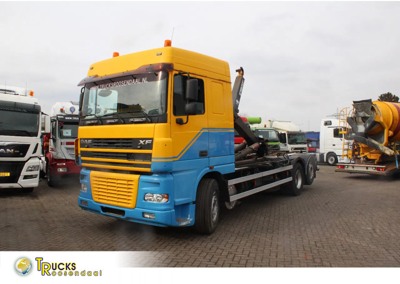 DAF XF 95.530 + hooksystem + 26T - Konkstõstukiga veoauto: pilt 1 DAF XF 95.530 + hooksystem + 26T - Konkstõstukiga veoauto: pilt 1