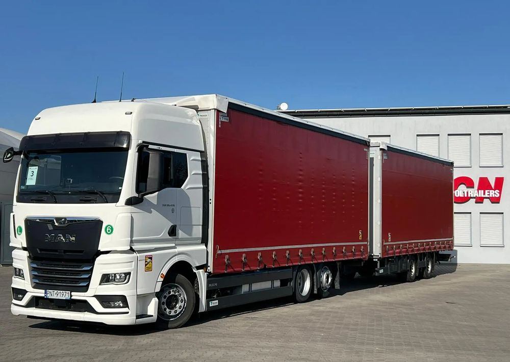 MAN TGX 26.470 z przyczepą Redos - Tent veoauto: pilt 1 MAN TGX 26.470 z przyczepą Redos - Tent veoauto: pilt 1