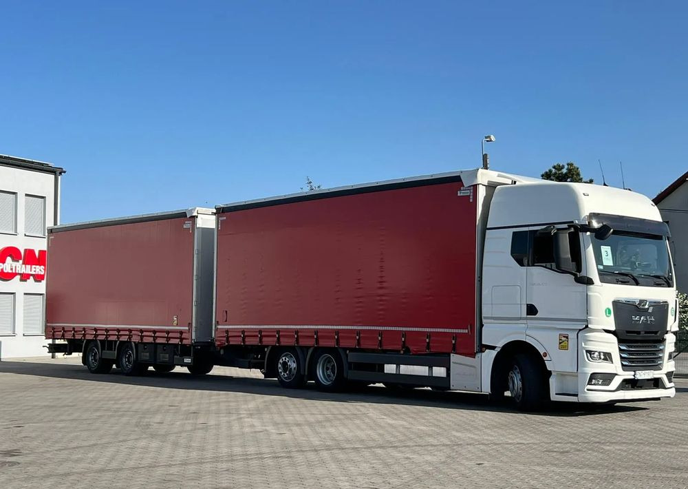 MAN TGX 26.470 z przyczepą Redos - Tent veoauto: pilt 2 MAN TGX 26.470 z przyczepą Redos - Tent veoauto: pilt 2