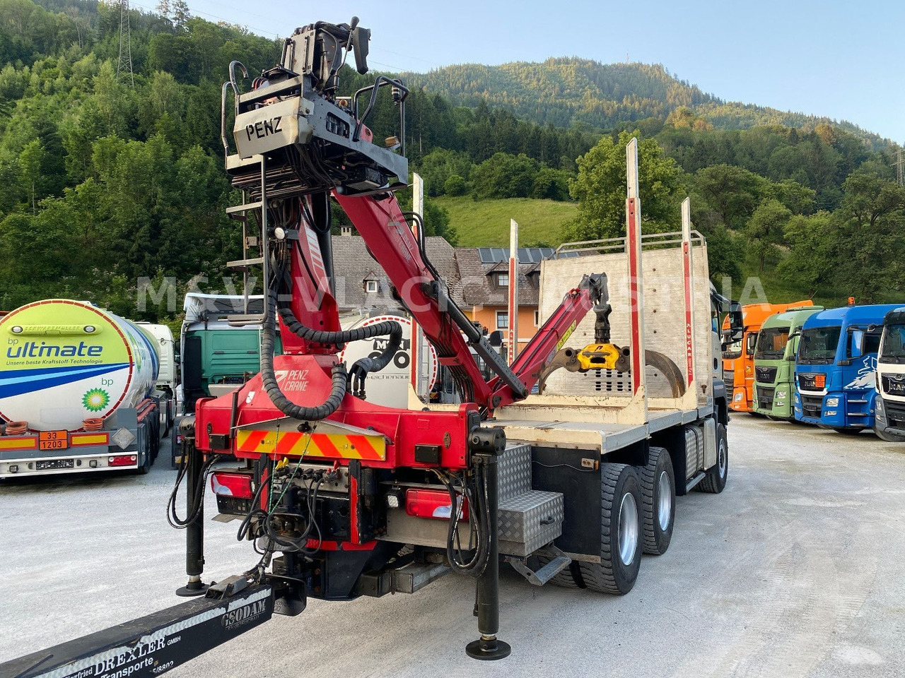 MAN 33.500 6X6 mit Kran PENZ 12Z - Metsaveok, Kraanaga veoauto: pilt 3 MAN 33.500 6X6 mit Kran PENZ 12Z - Metsaveok, Kraanaga veoauto: pilt 3