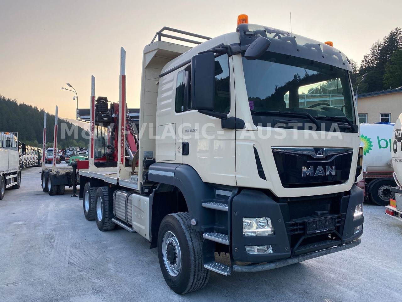 MAN 33.500 6X6 mit Kran PENZ 12Z - Metsaveok, Kraanaga veoauto: pilt 2 MAN 33.500 6X6 mit Kran PENZ 12Z - Metsaveok, Kraanaga veoauto: pilt 2