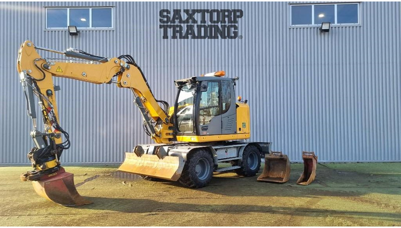 Liebherr A910 Compact, Hjulgrävare - Ratastel ekskavaator: pilt 1 Liebherr A910 Compact, Hjulgrävare - Ratastel ekskavaator: pilt 1