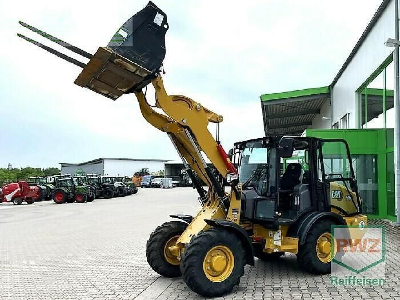Caterpillar 906 radlader - Miniekskavaator: pilt 1 Caterpillar 906 radlader - Miniekskavaator: pilt 1