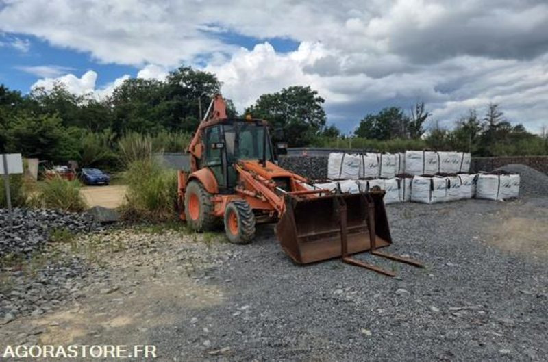 TRACTOPELLE NEW HOLLAND HITACHI FB100 - 031003055 / 1996 - 6337 HEURES - Ekskavaator-laadur: pilt 1 TRACTOPELLE NEW HOLLAND HITACHI FB100 - 031003055 / 1996 - 6337 HEURES - Ekskavaator-laadur: pilt 1