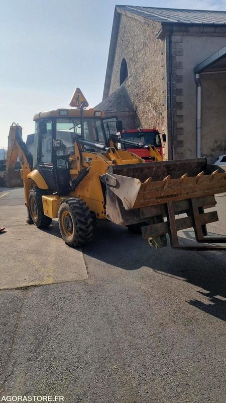 Tractopelle JCB 2CX 4WS (2009) - Vente à Professionnel - Ekskavaator-laadur: pilt 1 Tractopelle JCB 2CX 4WS (2009) - Vente à Professionnel - Ekskavaator-laadur: pilt 1