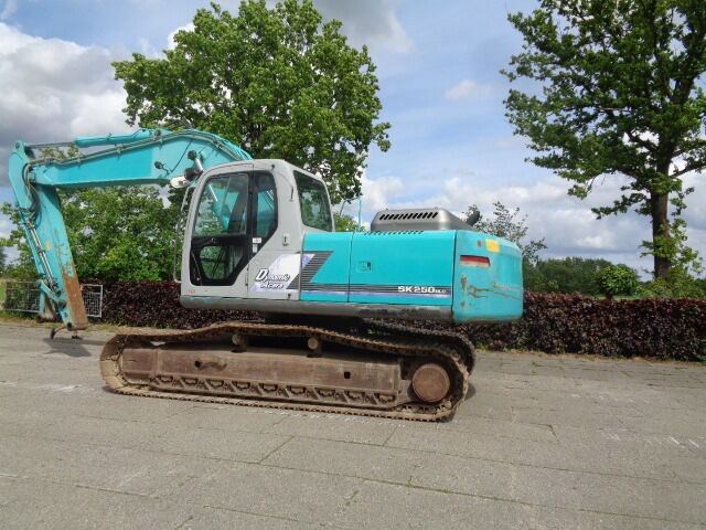 Kobelco SK250NLC - Lintekskavaator: pilt 1 Kobelco SK250NLC - Lintekskavaator: pilt 1
