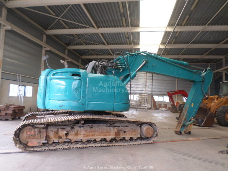 New Holland Kobelco Kobelco E 235 BSR-2 E 235 BSR-2 - Lintekskavaator: pilt 2 New Holland Kobelco Kobelco E 235 BSR-2 E 235 BSR-2 - Lintekskavaator: pilt 2