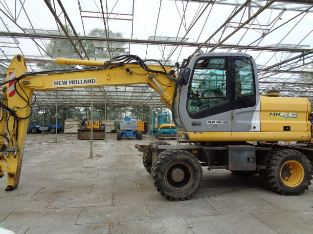 New Holland MH 4.6 - Ratastel ekskavaator: pilt 1 New Holland MH 4.6 - Ratastel ekskavaator: pilt 1