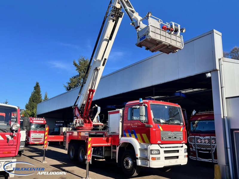 MAN TGA 26.350 Magirus ALP 320L = 32 meter, Waterpomp, 6x4, Bladgeveerd - Tuletõrjeauto: pilt 2 MAN TGA 26.350 Magirus ALP 320L = 32 meter, Waterpomp, 6x4, Bladgeveerd - Tuletõrjeauto: pilt 2