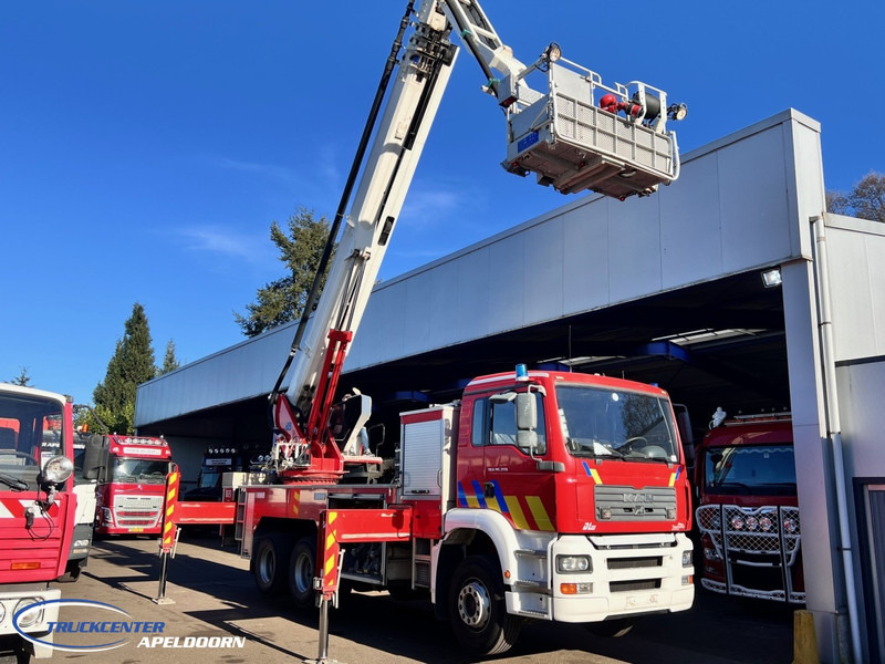 MAN TGA 26.350 Magirus ALP 320L = 32 meter, Waterpump, 6x4, Steel springs - Veoauto: pilt 2 MAN TGA 26.350 Magirus ALP 320L = 32 meter, Waterpump, 6x4, Steel springs - Veoauto: pilt 2
