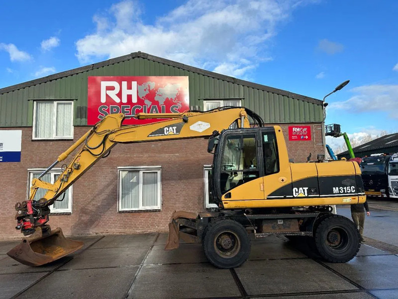 Caterpillar M315C WITH ROTOTILT, CE - Ratastel ekskavaator: pilt 1 Caterpillar M315C WITH ROTOTILT, CE - Ratastel ekskavaator: pilt 1