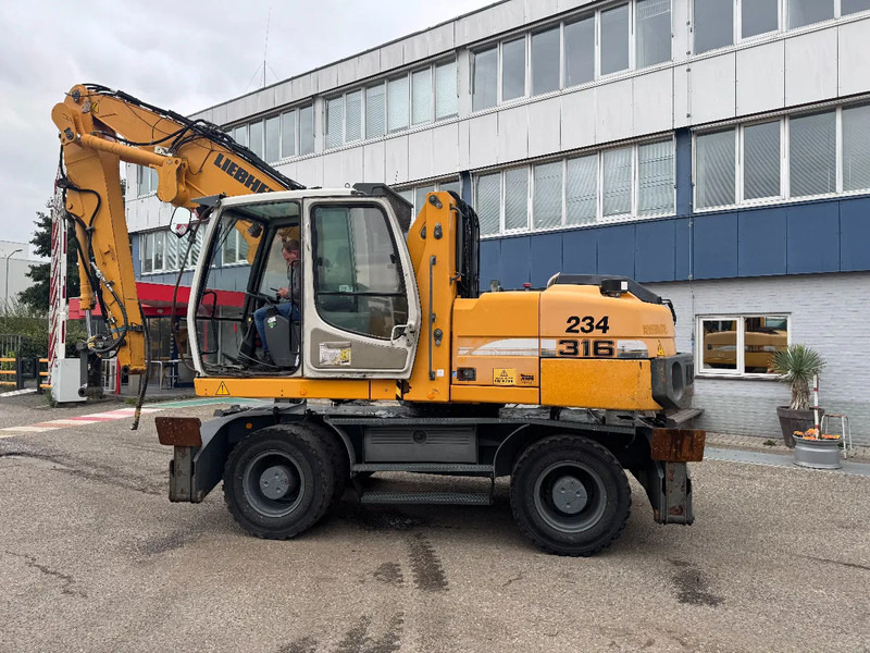 Liebherr A 316 LITRONIC CABIN HIGH CE - Jäätme-/ Tööstuslik käitleja: pilt 3 Liebherr A 316 LITRONIC CABIN HIGH CE - Jäätme-/ Tööstuslik käitleja: pilt 3