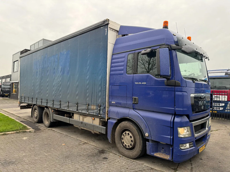 MAN TGX 26.400 6X2 - EURO 4 + LIFT + STEERING AXLE + TÜV 10-2025 - Tent veoauto: pilt 3 MAN TGX 26.400 6X2 - EURO 4 + LIFT + STEERING AXLE + TÜV 10-2025 - Tent veoauto: pilt 3