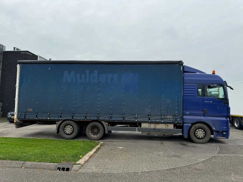 MAN TGX 26.400 6X2 - EURO 4 + LIFT + STEERING AXLE + TÜV 10-2025 - Tent veoauto: pilt 4 MAN TGX 26.400 6X2 - EURO 4 + LIFT + STEERING AXLE + TÜV 10-2025 - Tent veoauto: pilt 4