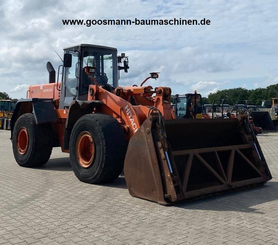 Hitachi LX 210 E - Rataslaadur: pilt 1 Hitachi LX 210 E - Rataslaadur: pilt 1