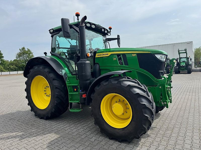 John Deere 6R215 AP 50KM COMMAND-PRO 2023 2690 UUR!!! - Traktor: pilt 2 John Deere 6R215 AP 50KM COMMAND-PRO 2023 2690 UUR!!! - Traktor: pilt 2