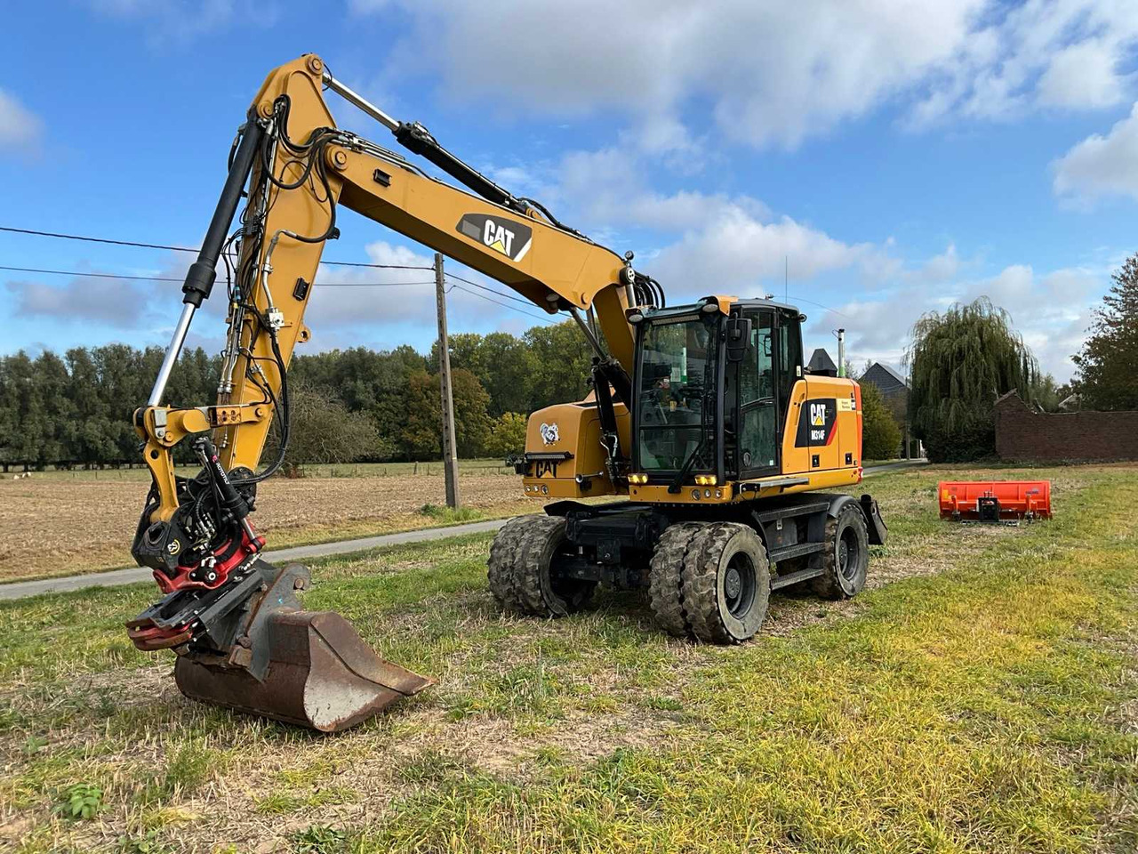Caterpillar M314F - Ratastel ekskavaator: pilt 1 Caterpillar M314F - Ratastel ekskavaator: pilt 1